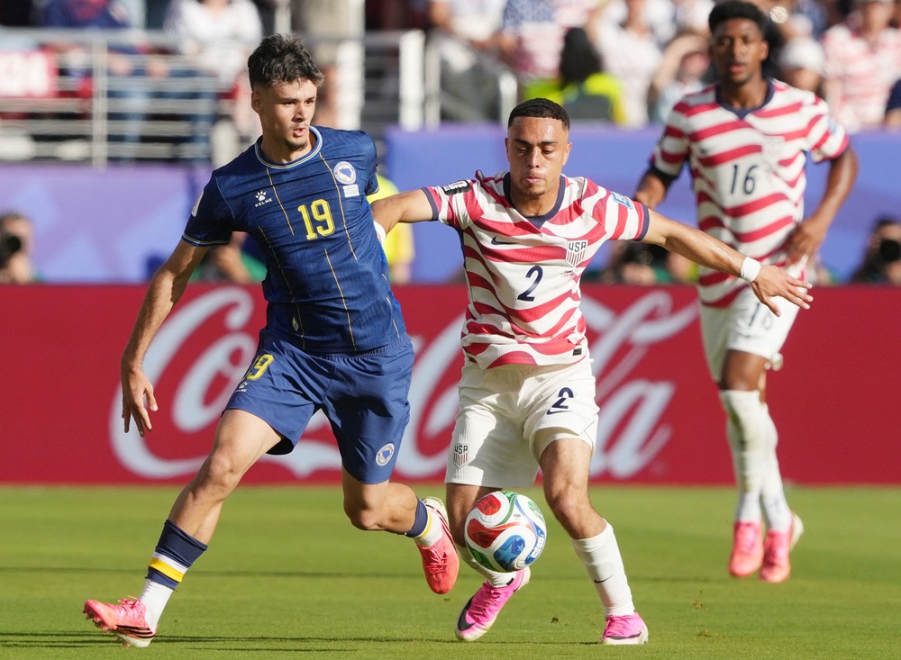 Sergino Dest of the USA in action with Bosnia and Herzegovina's Kerim Alajbegovic (Reuters)