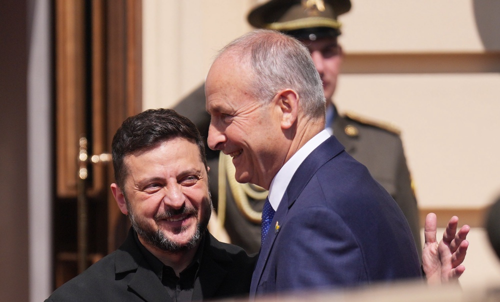 Ukrainian President Volodymyr Zelensky (left) greets Taoiseach Micheal Martin as he arrives at the Presidential Palace in Kyiv, Ukraine (Niall Carson/PA) (PA Wire)