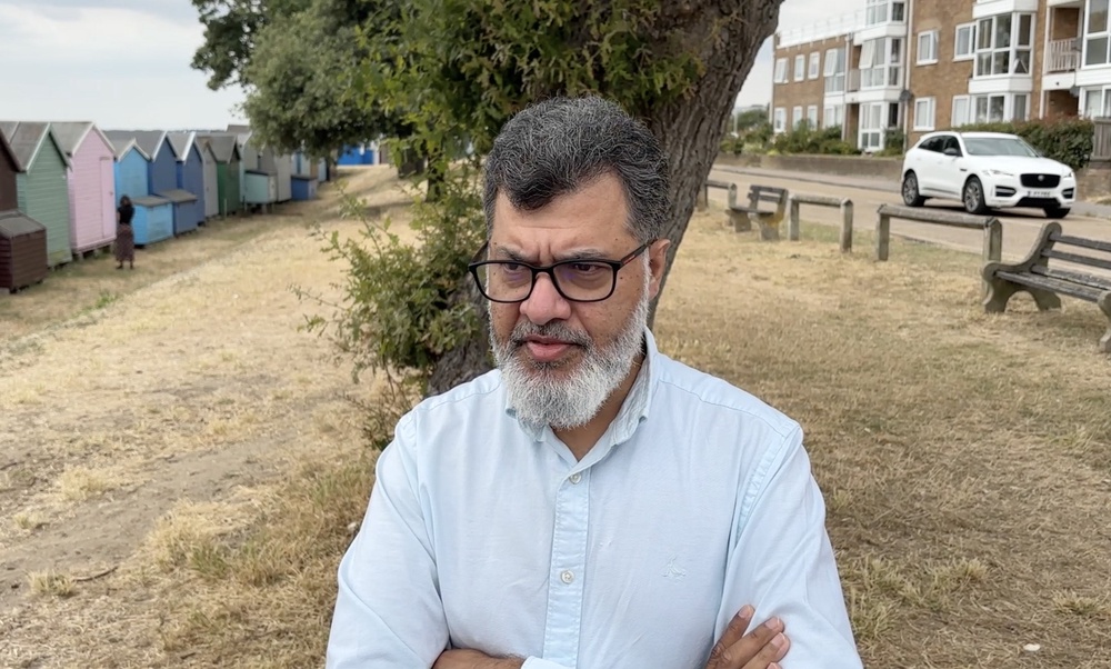 Family friend Mishba Uddin speaking to reporters in West Mersea (PA) (PA Wire)
