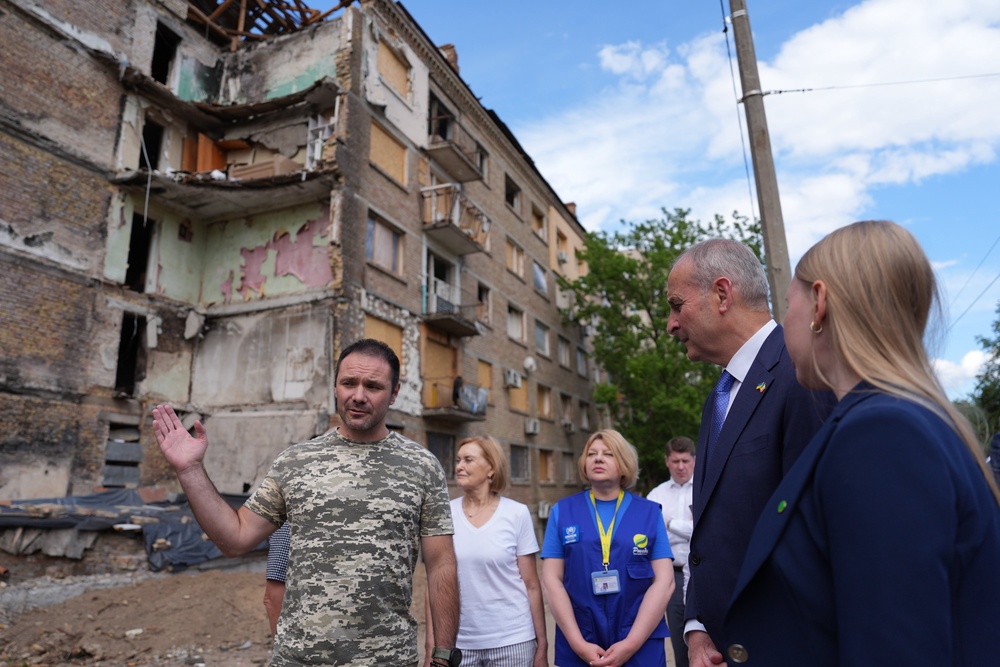 Micheál Martin is shown the bomb-damaged Lukianivska district of Kyiv (Niall Carson/PA) (PA Wire)
