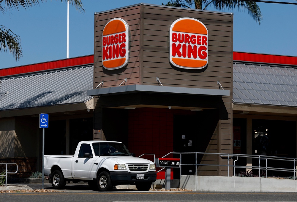 Customers can scan a QR code inside their Whopper box to redeem a free burger if they are unsatisfied (Getty Images)