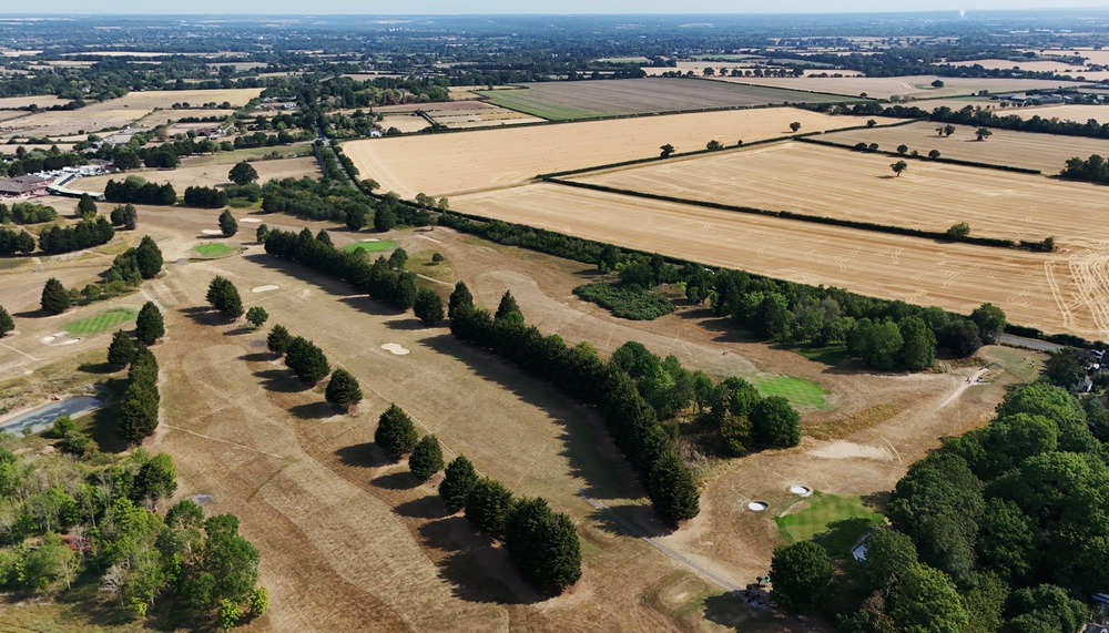 Golfers play a round at Bird Hills Golf Course, near Maidenhead, Berkshire, where the fairways show signs of impact from lack of recent rainfall (Jonathan Brady/PA) (PA Wire)
