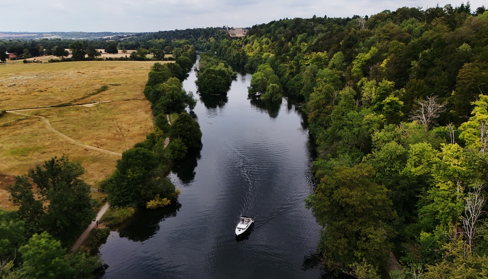 A pleasure craft travels along the River Thames near Cookham, Berkshire (Jonathan Brady/PA) (PA Wire)