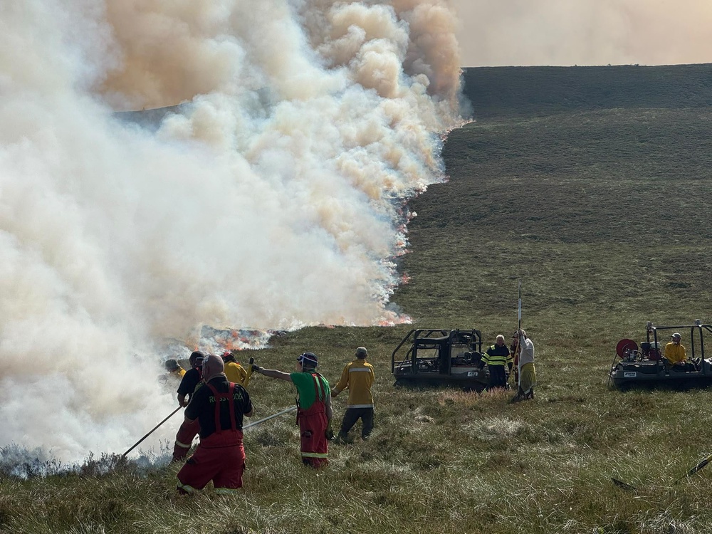 Firefighters and other agencies have been working to contain the blaze (RSPB Scotland) (PA Media)