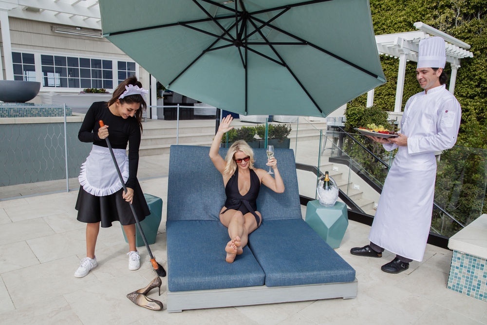 Every Saturday at 6 a.m., two weekend nannies arrive at Landis’s San Diego home to handle the morning rush and wake her children, allowing her to stay in bed until 9 a.m. for coffee and conversation with her husband (Dayley Photography)