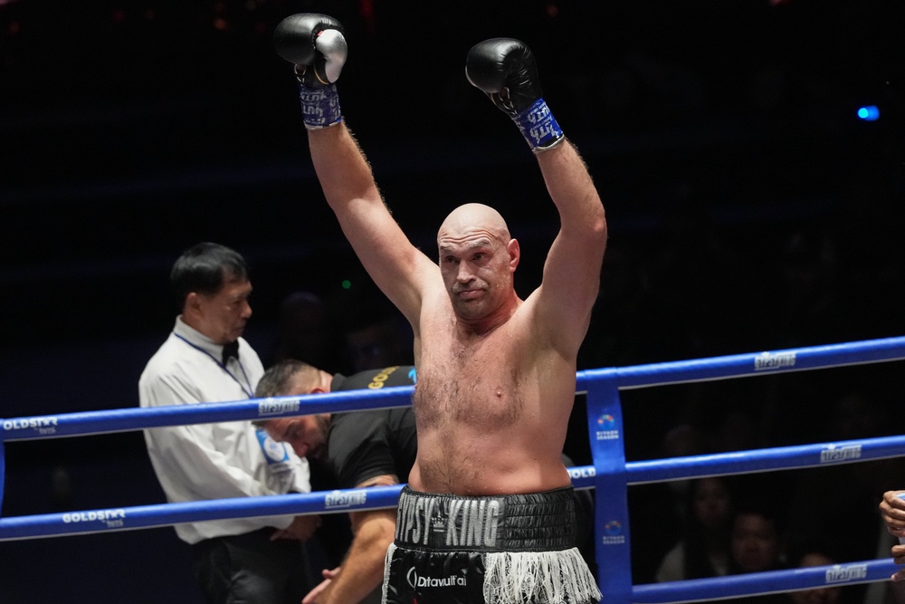 Tyson Fury celebrates victory (Sakchai Lalit/AP). (AP)