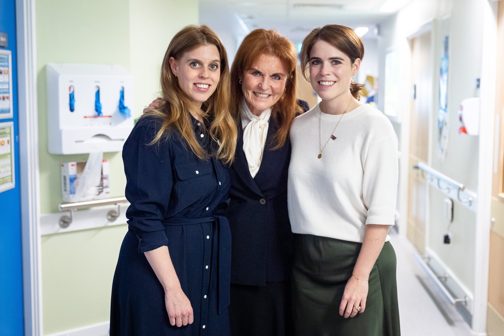 Sarah with her daughters Princess Beatrice and Princess Eugenie during a visit to the Teenage Cancer Trust unit at University College Hospital, London (Aaron Chown/PA) (PA Archive)