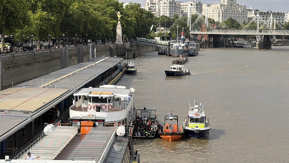 Officers are tended on one of the moored boats (David Lynch/PA) (PA Wire)