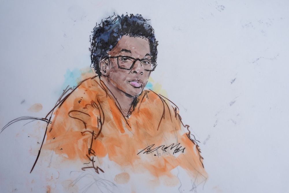 D4vd, whose legal name is David Burke, sat next to his lawyers in orange jail clothes and glasses, and did not show any emotion during the testimony (AP Photo/Bill Robles)