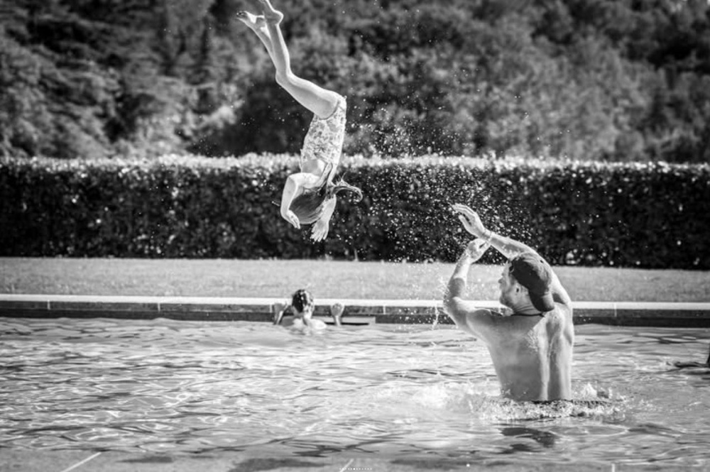 Prince Harry throws Princess Lilibet in swimming pool in family’s summer holiday photos (Instagram)