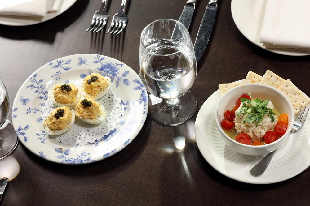 Dishes on display with glass of water (Getty Images for Tennessee Touri)