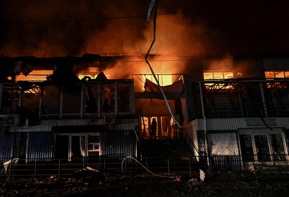 Rescuers work at a site of the central market hit by Russian drone strike, amid Russia's attack on Ukraine, in Zaporizhzhia, Ukraine July 25, 2026. (Reuters)