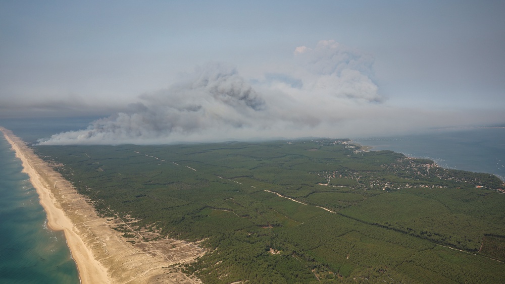 Smoke is seen billowing from the French fires (AFP/Getty)