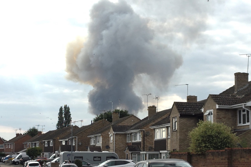 Smoke billows from a fire at an Essex industrial unit (Reuters)