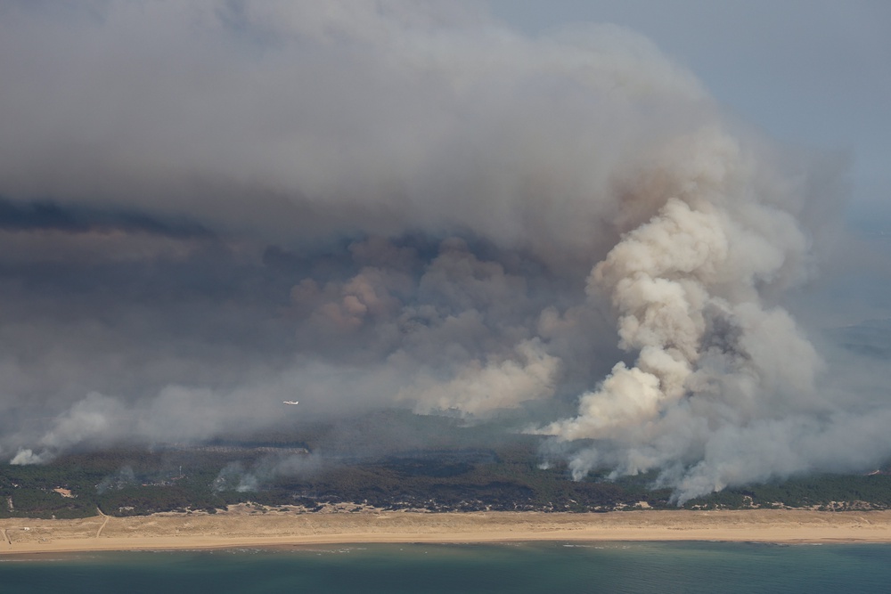 Hundreds of thousands have been evacuated as wildfires rage in France and Spain (AFP/Getty)