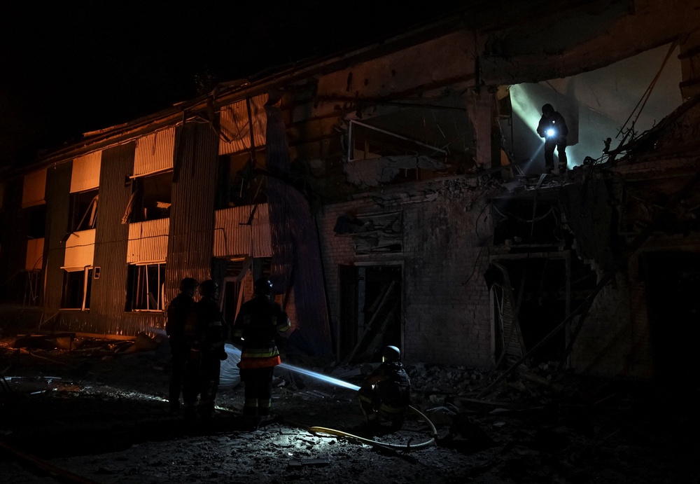 Rescuers work at a site of the central market hit by Russian drone strike, amid Russia's attack on Ukraine, in Zaporizhzhia, Ukraine July 25, 2026. (Reuters)