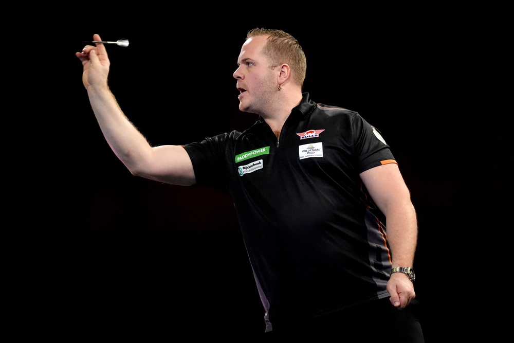 Dirk van Duijvenbode had no answer to the world champion’s relentless high scoring (John Walton/PA) (PA Archive)