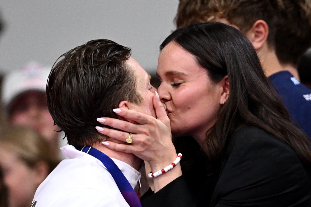 Ramsay-Peaty shared a kiss with wife Holly after the race (Getty)