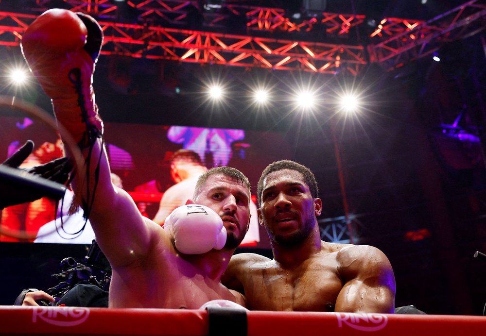 Joshua paid tribute to Prenga after the fight (Reuters)