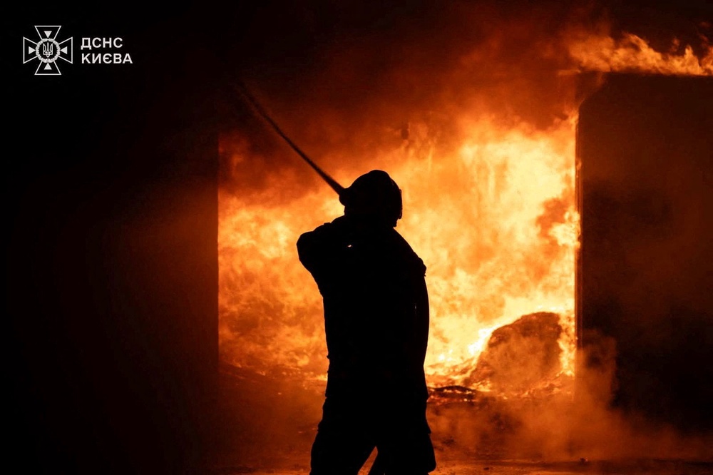 A firefighter works at a site of a Russian strike, amid Russia's attack on Ukraine, in a location given as Kyiv, Ukraine, in this handout picture released on July 26, 2026. (Reuters)