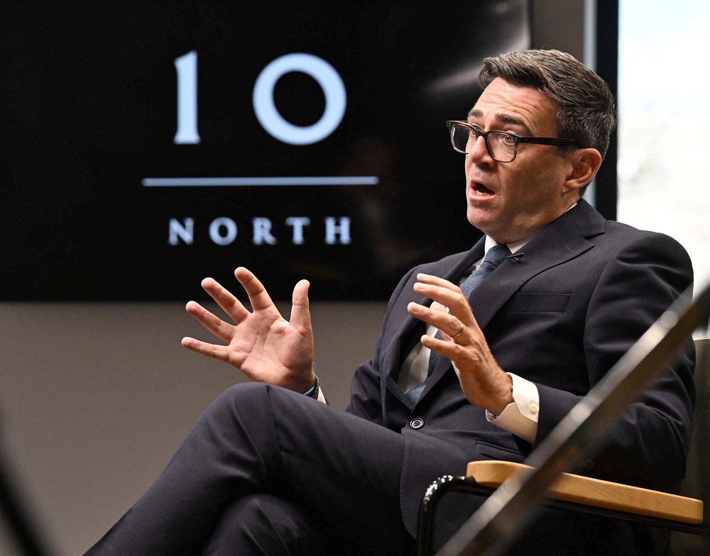 Andy Burnham speaking with BBC journalist Laura Kuenssberg at No 10 North at Heron House in Manchester (BBC)