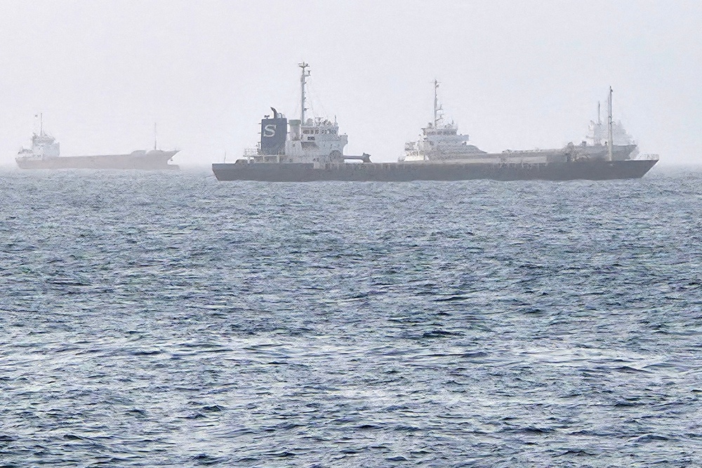 Vessels transiting through the Gulf of Oman are pictured off the coast of Muscat (AFP/Getty)