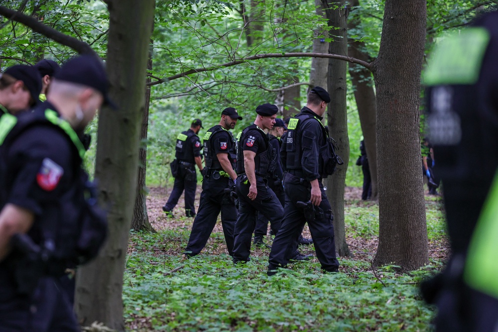 Police search parkland as the investigation continues (Getty)