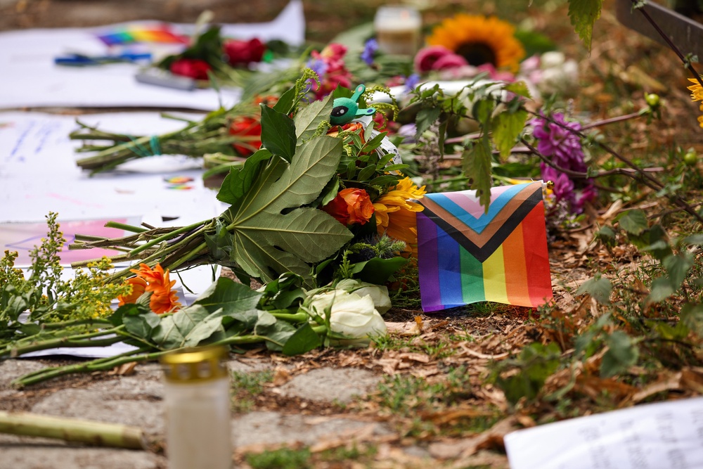 People have left flowers and messages of support at the scene of the attack (Getty)