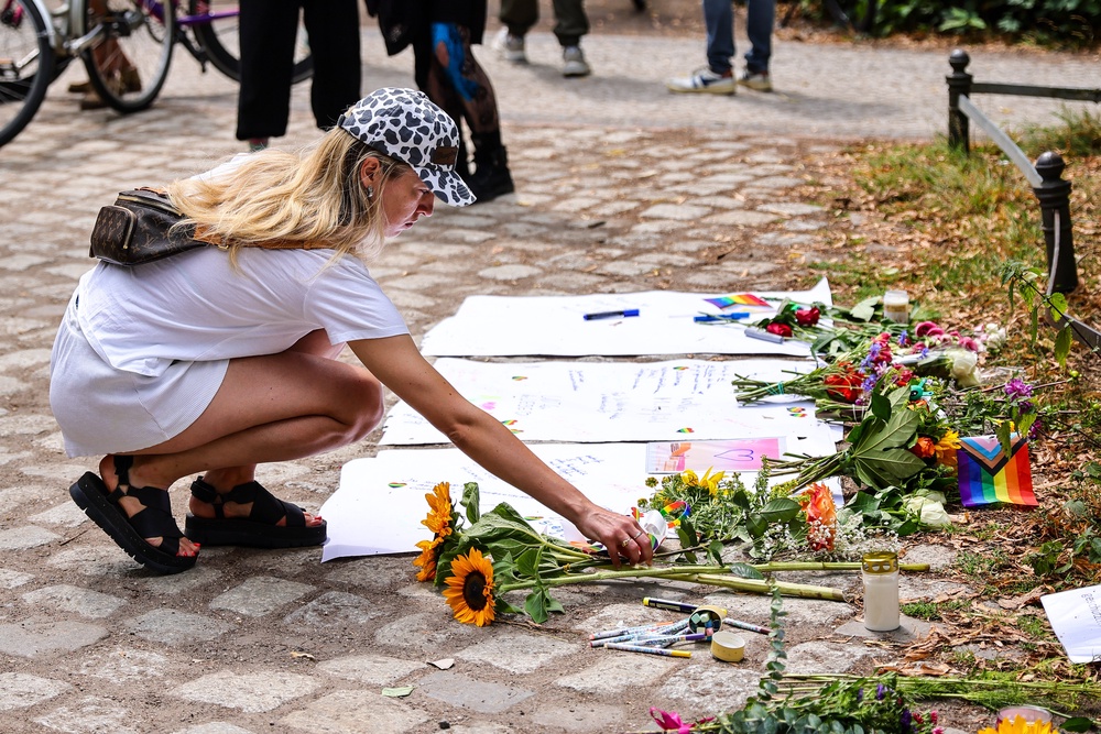 People have left flowers and messages of support at the scene of the attack (Getty)
