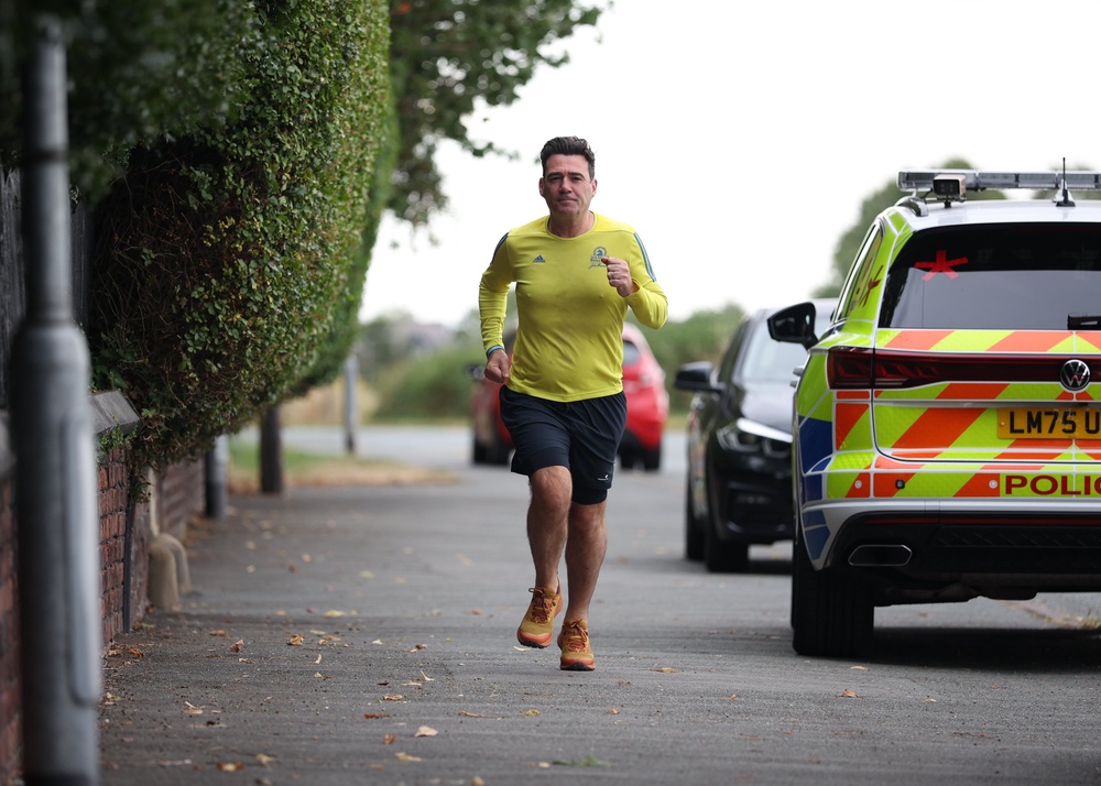 Prime Minister Andy Burnham running near his house in Warrington, Cheshire on Saturday morning (Ryan Jenkinson/PA) (PA Wire)
