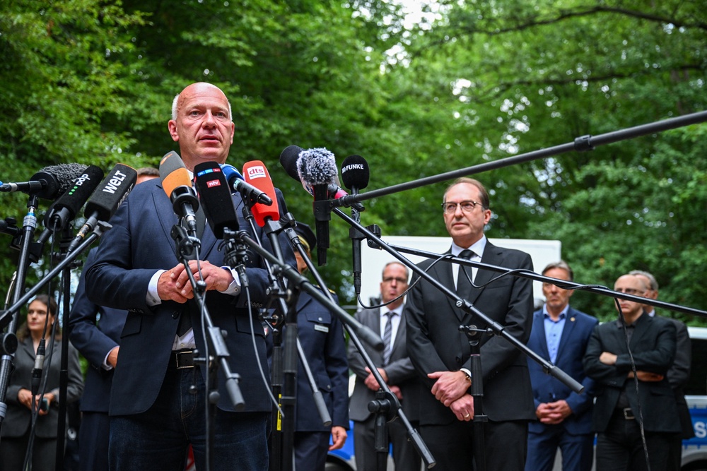 Berlin mayor Kai Wegner at the scene (Reuters)