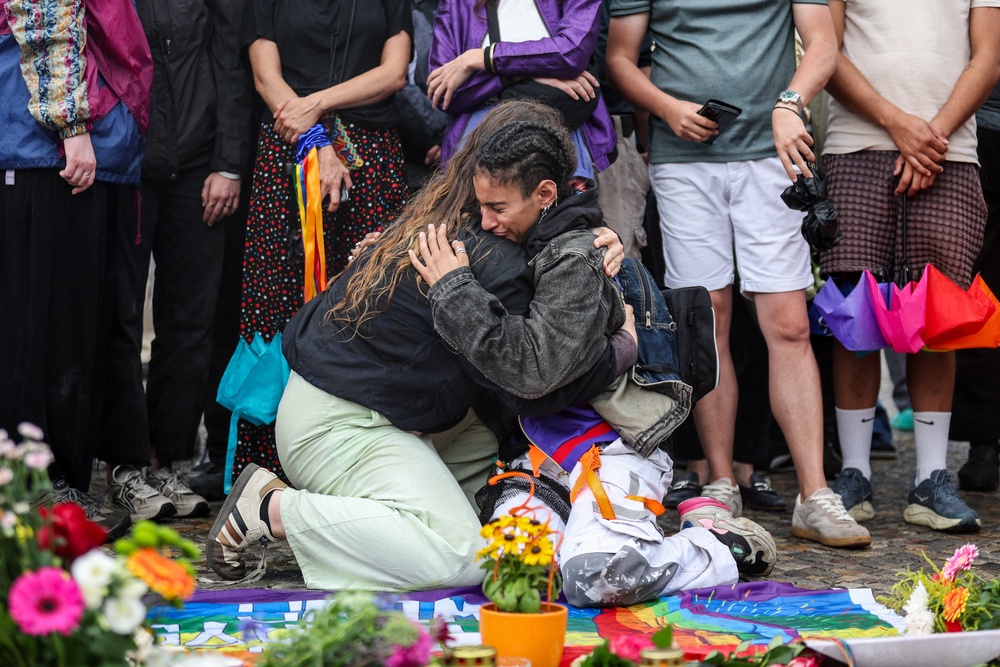 There were emotional scenes as crowds gathered in the wake of the attack (Reuters)