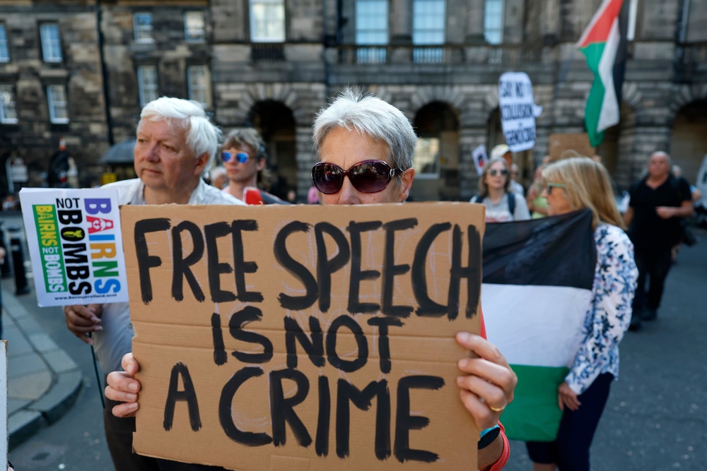 Activists protesting the Palestine Action ban outside court in Edinburgh (Getty)