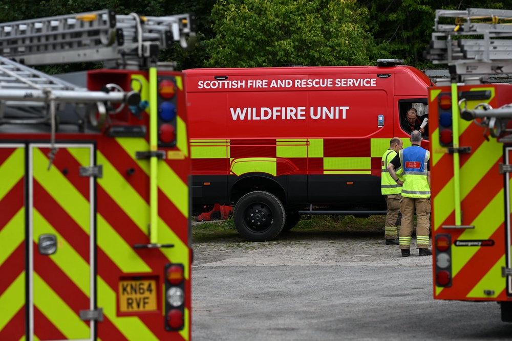 Scottish Fire and Rescue Service firefighters from the wildfire unit in Nethy Bridge, near Cairngorms National Park (Michal Wachucik/PA)