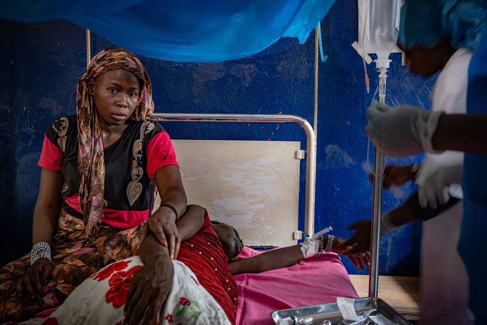 Radiya confirms her aunt Amna, who has malaria, just lost her baby at nine months and nearly bled to death herself (Bel Trew)