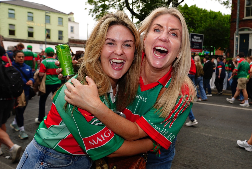 Fans celebrate after Mayo beat Kerry in the All Ireland Championship final, the team's first win since 1951 (PA)