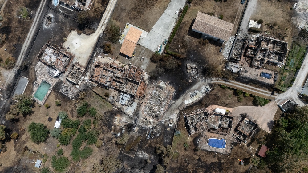 This aerial view shows damaged houses in a burnt area in the town of Le Porge, France (AFP/Getty)