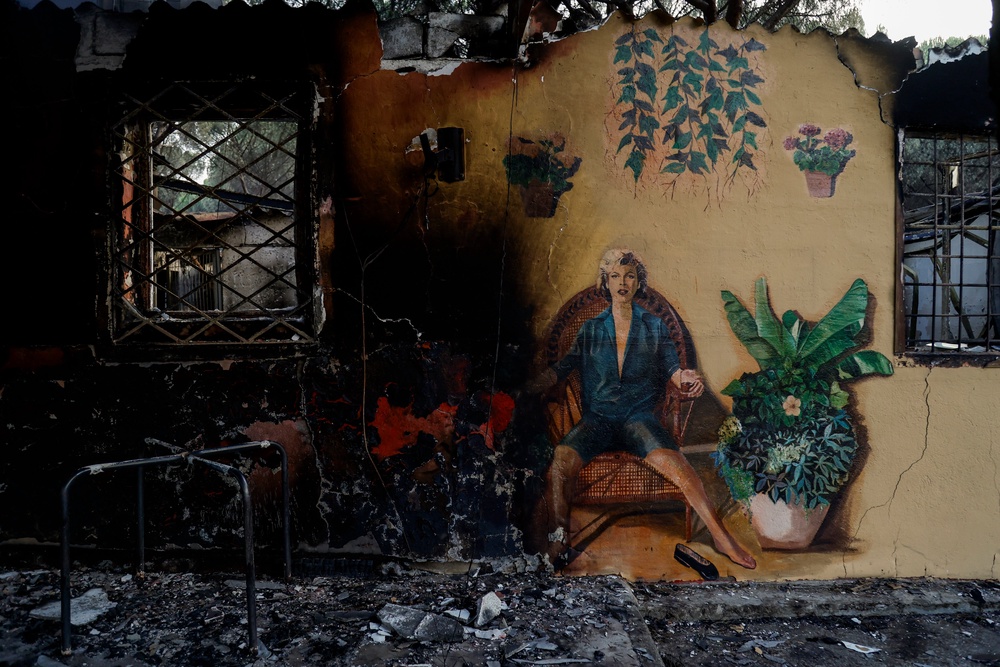 Serengeti bar is burnt out in Pantano de San Juan following wildfires (Getty)
