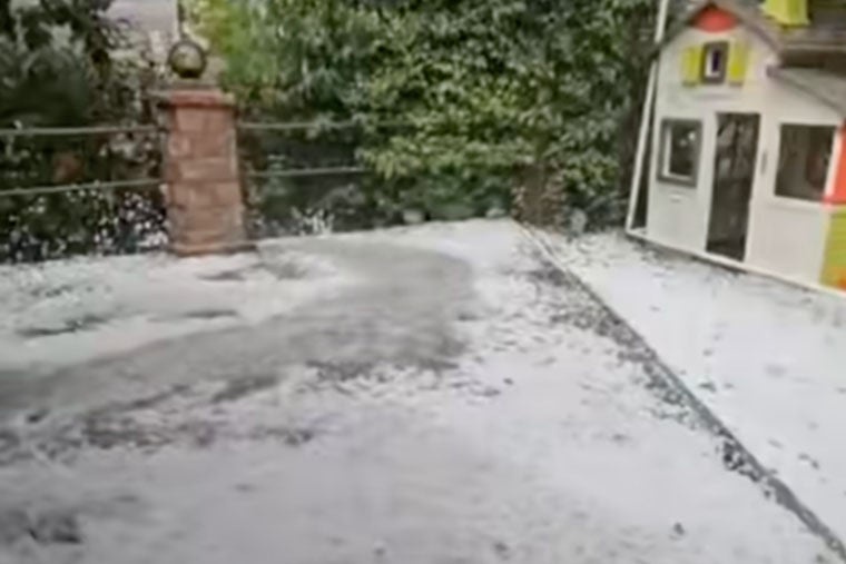 The snowfall was accompanied by violent downpours that battered the rest of the country (Sky News)