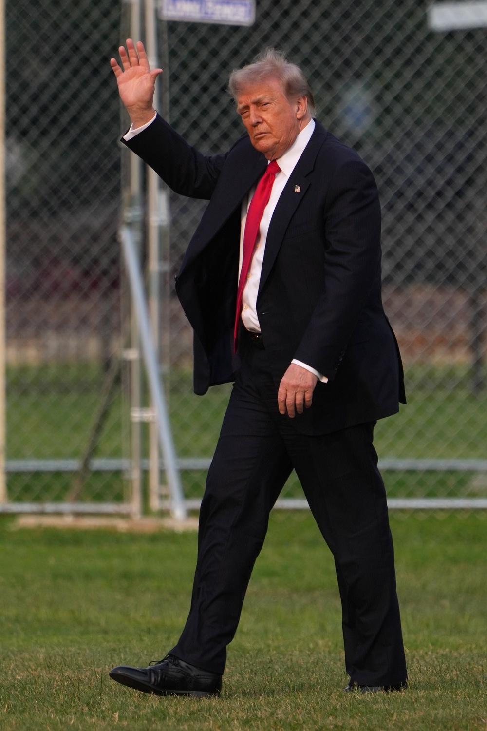 President Donald Trump walks after arriving on Marine One on the Ellipse, Monday, July 27, 2026, near the White House in Washington (AP)