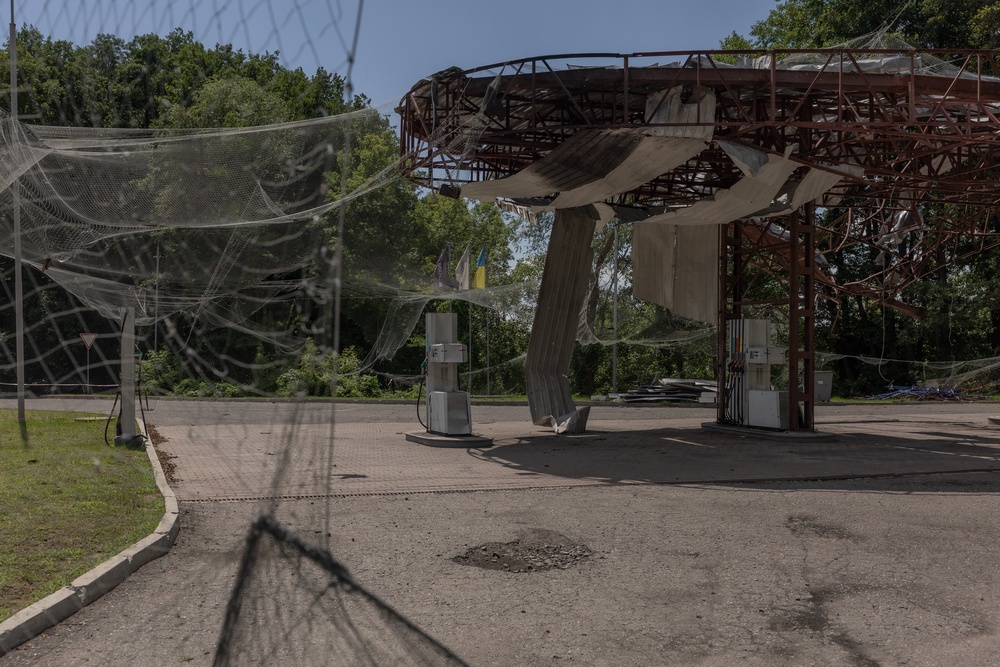 - This photograph shows a petrol station destroyed in an air attack in the town of Izium, in the eastern Kharkiv region (AFP/Getty)