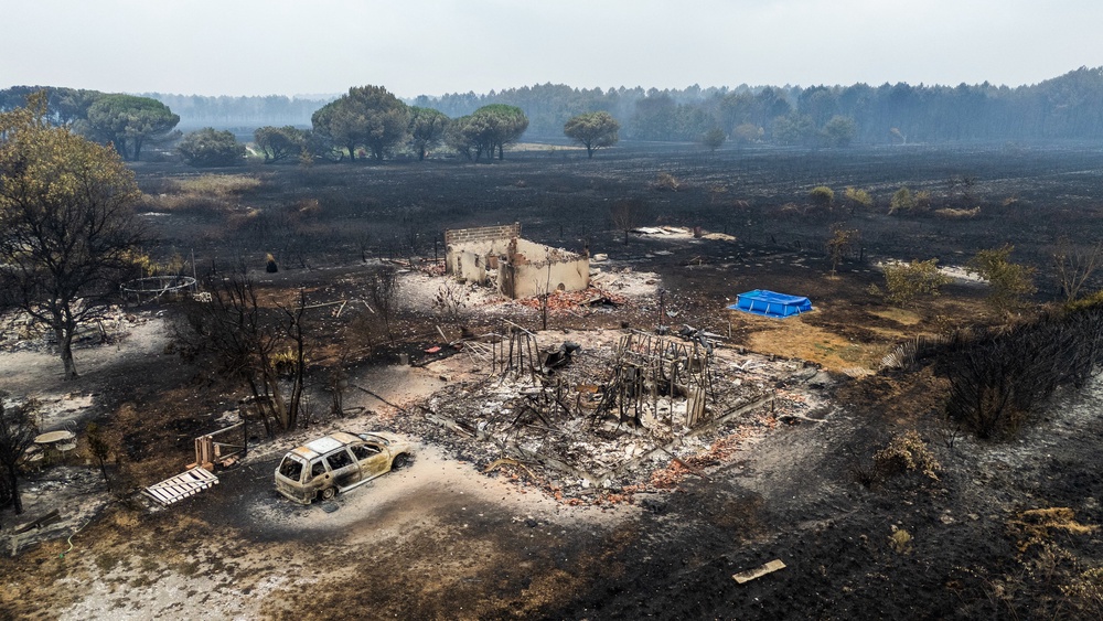 Hundreds of homes have been destroyed as the unprecedented fires have spread. Pictured is a burned out residence in Le Porge, Gironde (AFP/Getty)