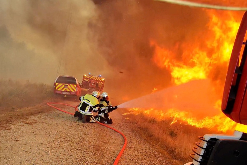 Firefighters are now racing against time to bring wildfires under control (Kara Nabil)