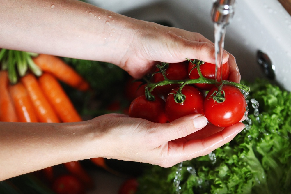 Washing produce is an important step to reduce the risk for cyclosporiasis (Getty)