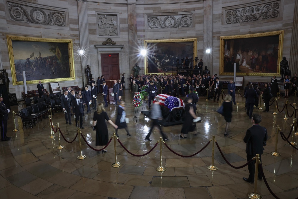 People pays their respects over the casket as it lies in state during a memorial tribute for the late U.S. Sen. Lindsey Graham (R-SC) in the Rotunda of the U.S. Capitol (Getty Images)
