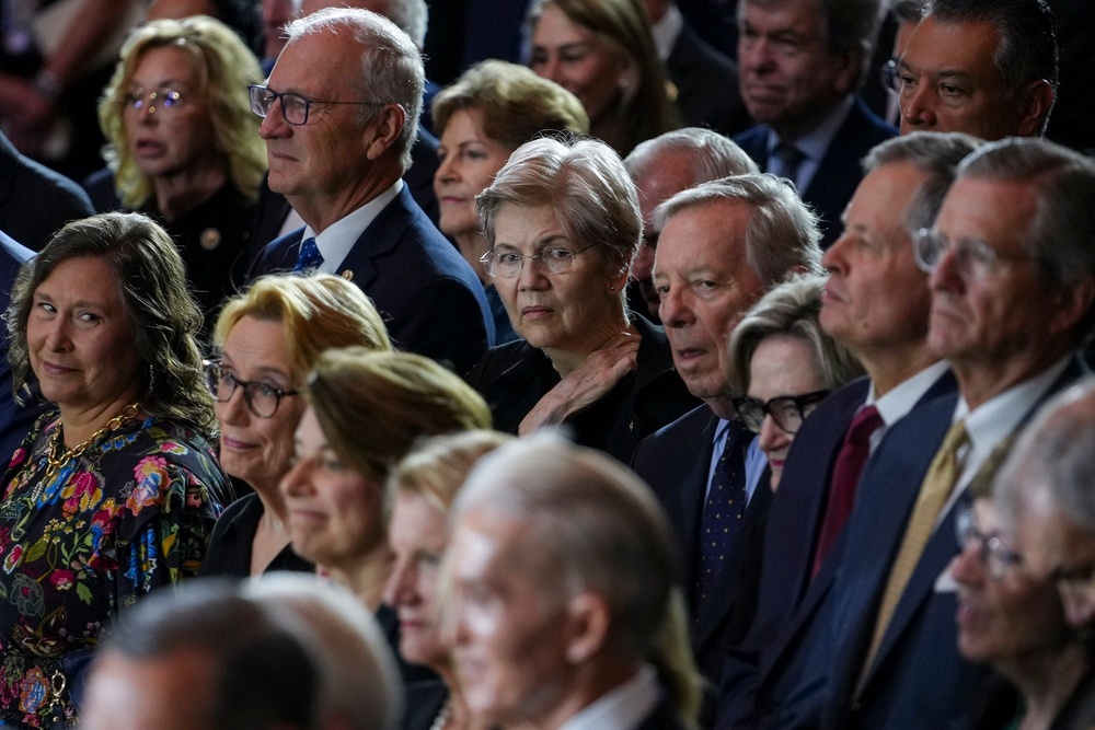 A group of senators, including Elizabeth Warren, Dick Durbin and Amy Klobuchar, were seen gathered inside the Rotunda (Getty Images)