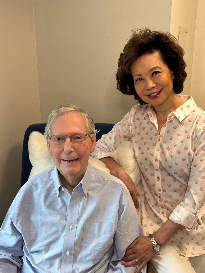 McConnell’s office released a photo Monday showing the 84-year-old senator with his wife Elaine Chao sitting upright and smiling after being hospitalized for six weeks due to a fall (Reuters)