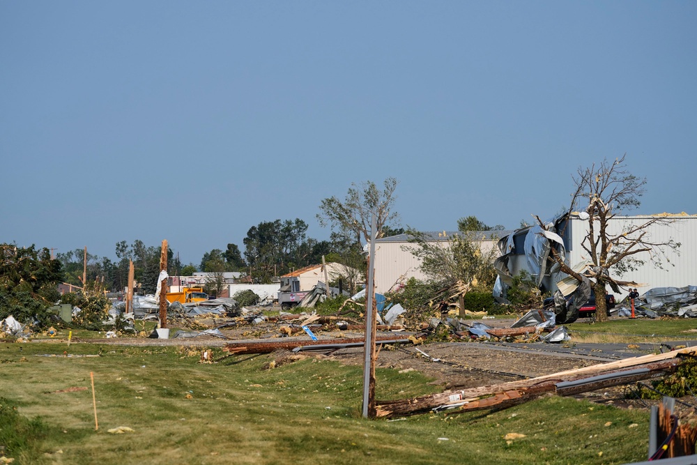 It hollowed out homes, tossed around cars and toppled power lines (AP Photo/Kayla Wolf)