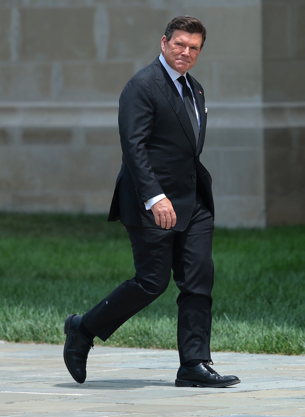 Fox News anchor Bret Baier arrives for the funeral service on Tuesday (Getty Images)
