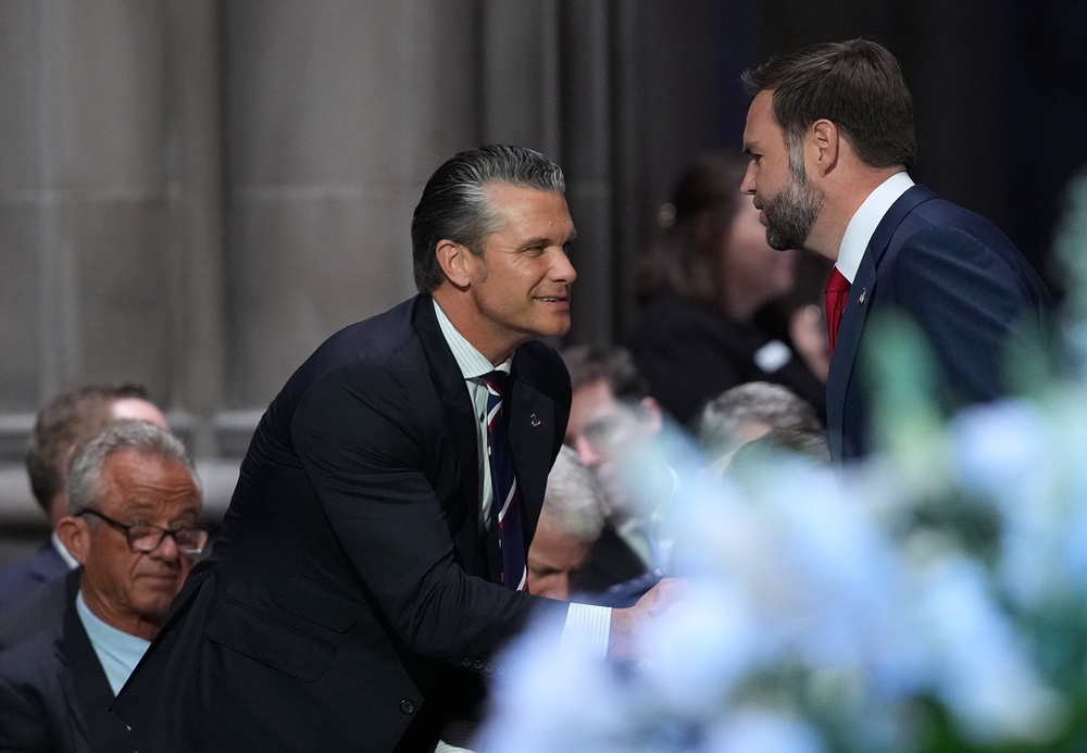 Secretary of War Pete Hegseth greets Vice President JD Vance at the funeral service for the late Sen. Lindsey Graham (Getty Images)